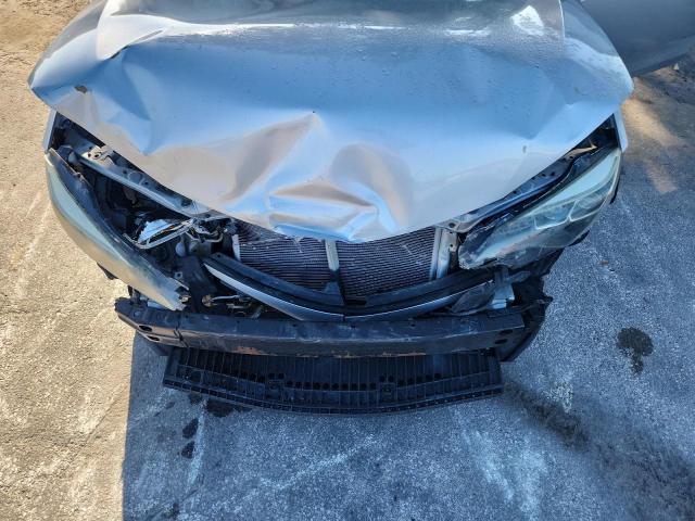 5YFBURHE8JP764705 - 2018 TOYOTA COROLLA L SILVER photo 11