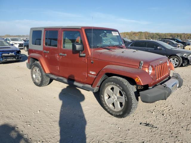 1J4GA59119L732082 - 2009 JEEP WRANGLER U SAHARA ORANGE photo 4
