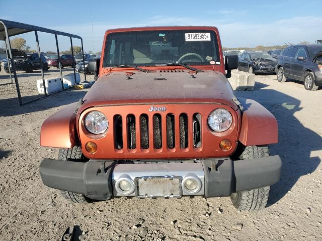 1J4GA59119L732082 - 2009 JEEP WRANGLER U SAHARA ORANGE photo 5