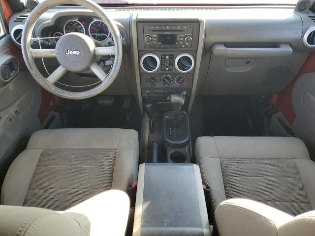 1J4GA59119L732082 - 2009 JEEP WRANGLER U SAHARA ORANGE photo 8