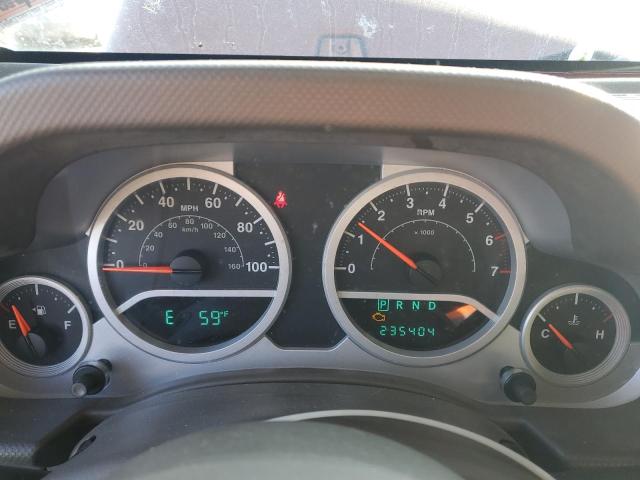 1J4GA59119L732082 - 2009 JEEP WRANGLER U SAHARA ORANGE photo 9