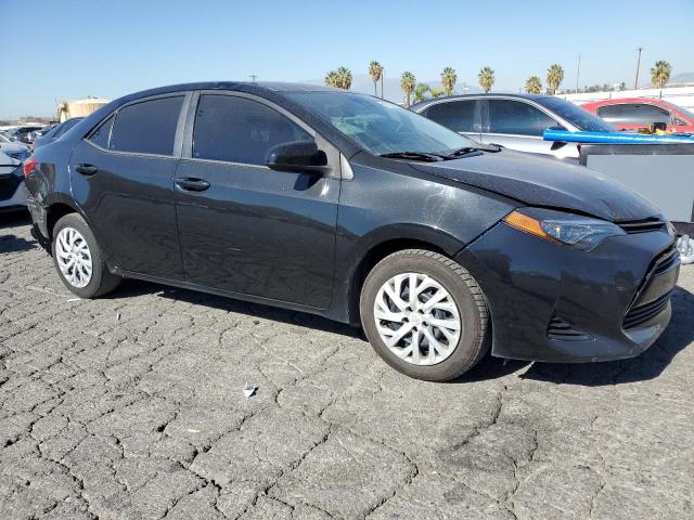 5YFBURHE9JP835930 - 2018 TOYOTA COROLLA L 黑色 照片 4