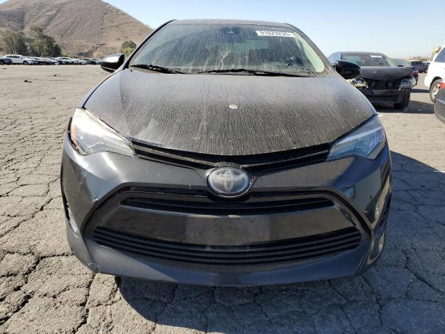 5YFBURHE9JP835930 - 2018 TOYOTA COROLLA L 黑色 照片 5