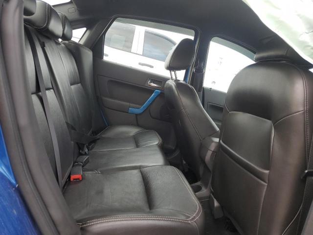 1FAHP3GN8AW186280 - 2010 FORD FOCUS SES BLUE photo 10