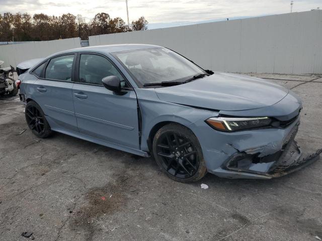 2HGFE2F55PH509311 - 2023 HONDA CIVIC SPORT BLUE photo 4