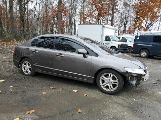 19XFA1F56BE040495 - 2011 HONDA CIVIC LX رمادي صورة 4