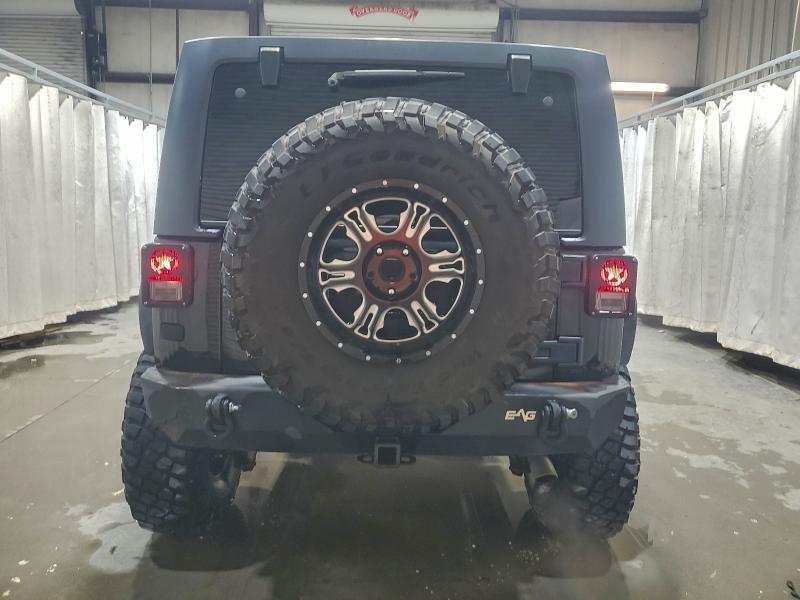 1C4BJWEG4CL120370 - 2012 JEEP WRANGLER U SAHARA BLACK photo 6