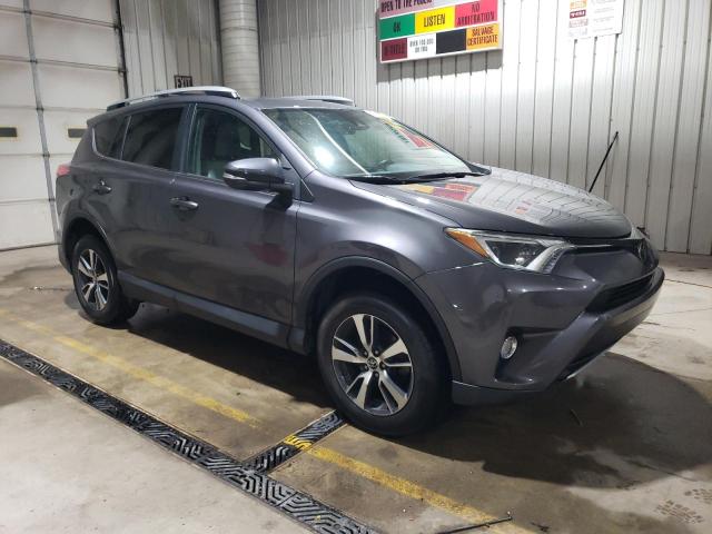 2T3RFREV0HW609174 - 2017 TOYOTA RAV4 XLE ნაცრისფერი ფოტო 4