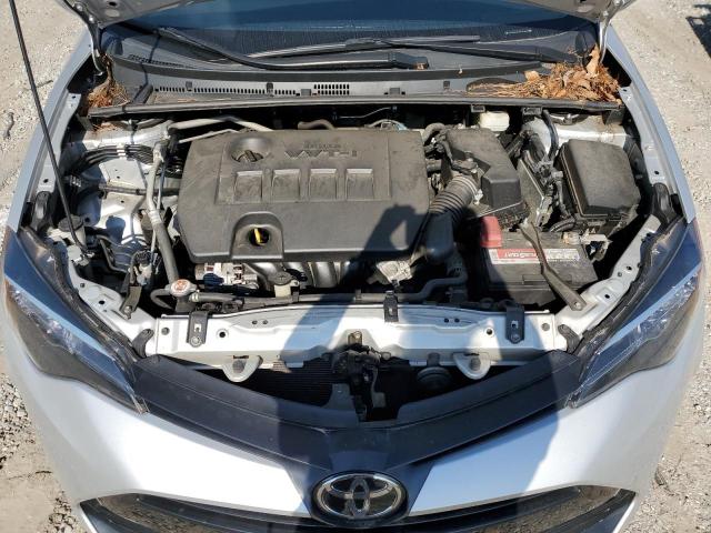 5YFBURHE6KP906907 - 2019 TOYOTA COROLLA L Gümüş fotoğraf 11