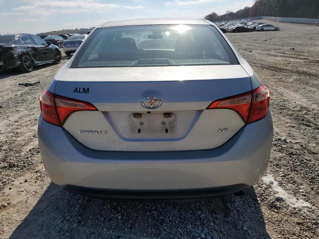 5YFBURHE6KP906907 - 2019 TOYOTA COROLLA L Gümüş fotoğraf 6