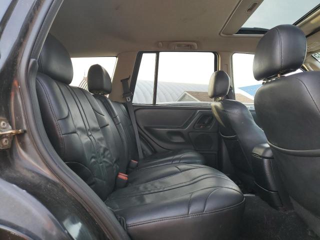 1J4GW48S64C349401 - 2004 JEEP GRAND CHER LAREDO შავი ფოტო 11