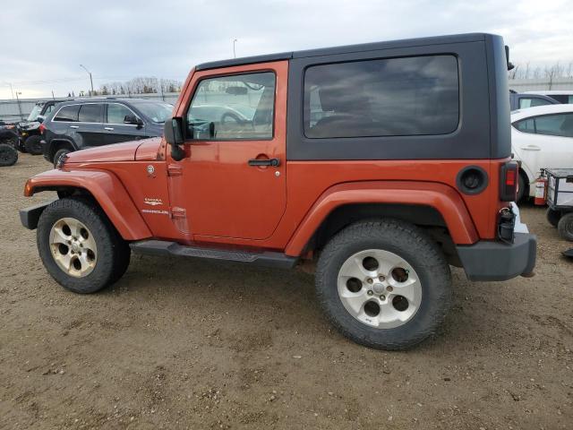 1J4FA54189L723415 - 2009 JEEP WRANGLER SAHARA ნარინჯისფერი ფოტო 2