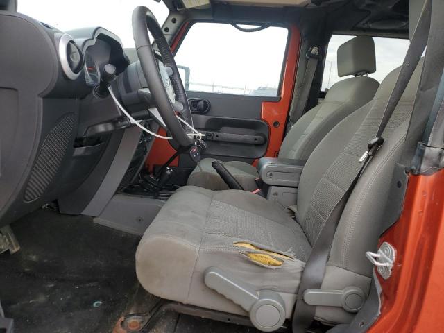 1J4FA54189L723415 - 2009 JEEP WRANGLER SAHARA ნარინჯისფერი ფოტო 7