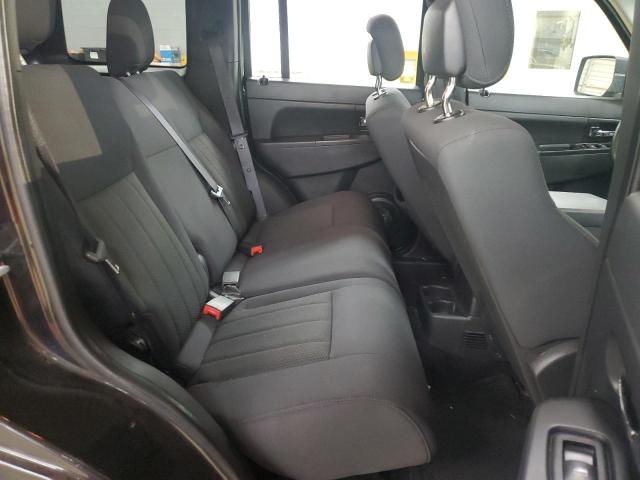 1C4PJLAK7CW103737 - 2012 JEEP LIBERTY SPORT BLACK photo 11