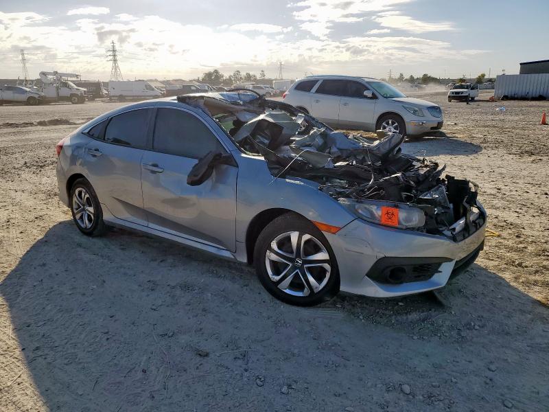 2HGFC2F57JH602070 - 2018 HONDA CIVIC LX Silber Foto 4