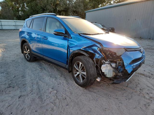 JTMRFREVXGJ099641 - 2016 TOYOTA RAV4 XLE BLUE photo 4