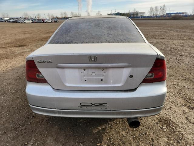 1HGEM22522L817410 - 2002 HONDA CIVIC LX SILVER photo 6