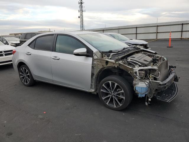 5YFBURHE8HP603538 - 2017 TOYOTA COROLLA L ვერცხლისფერი ფოტო 4