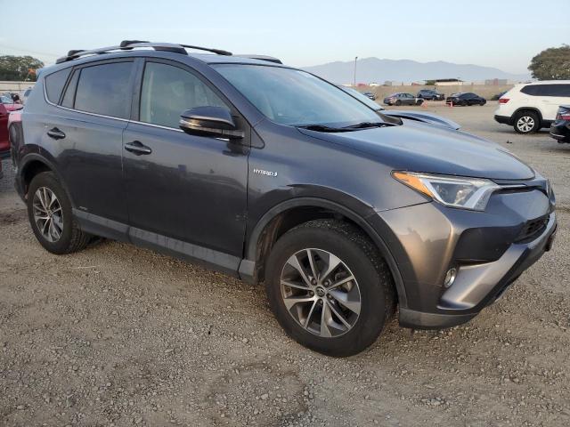 JTMRJREV1JD170066 - 2018 TOYOTA RAV4 HV LE فحمي صورة 4