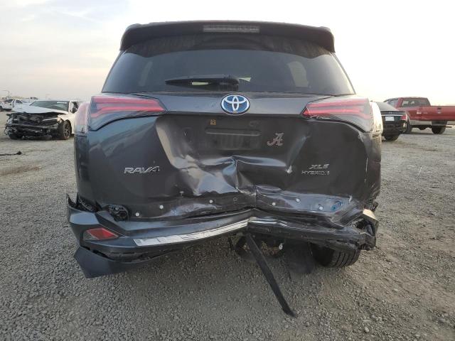 JTMRJREV1JD170066 - 2018 TOYOTA RAV4 HV LE فحمي صورة 6