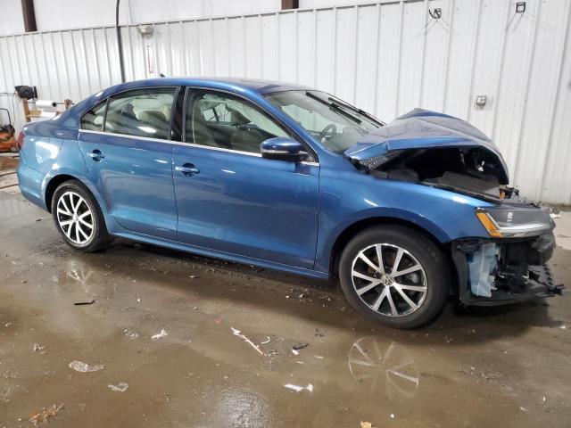 3VWDB7AJ4HM292351 - 2017 VOLKSWAGEN JETTA SE BLUE photo 4
