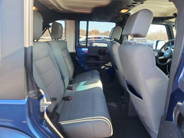 1J4GA59149L744002 - 2009 JEEP WRANGLER U SAHARA Көк фото 10