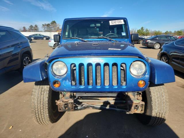 1J4GA59149L744002 - 2009 JEEP WRANGLER U SAHARA Көк фото 5