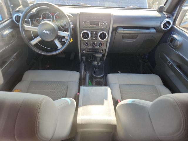 1J4GA59149L744002 - 2009 JEEP WRANGLER U SAHARA Көк фото 8