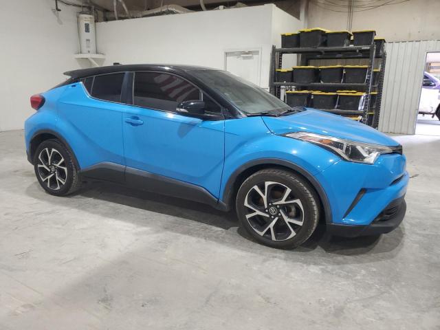 JTNKHMBX7K1018636 - 2019 TOYOTA C-HR XLE Синий фото 4