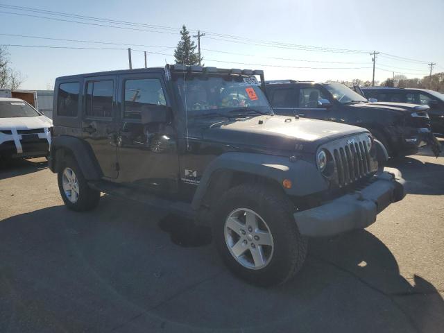 1J4GA39109L766079 - 2009 JEEP WRANGLER X Սև լուսանկար 4