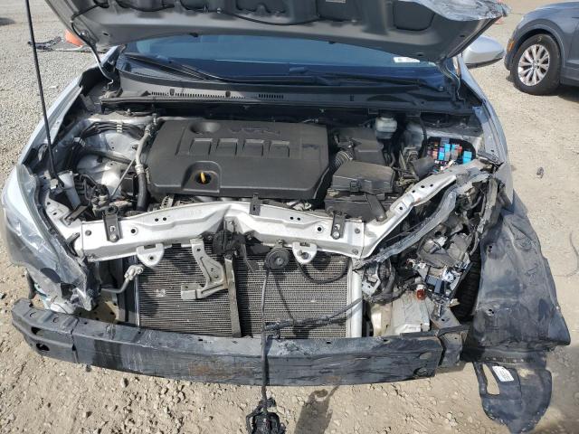 5YFBURHE5KP931071 - 2019 TOYOTA COROLLA L ვერცხლისფერი ფოტო 11