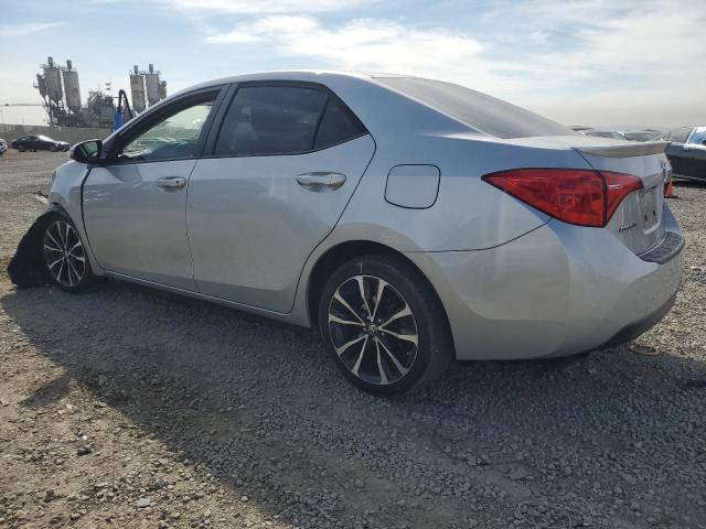 5YFBURHE5KP931071 - 2019 TOYOTA COROLLA L ვერცხლისფერი ფოტო 2