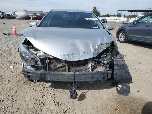 5YFBURHE5KP931071 - 2019 TOYOTA COROLLA L ვერცხლისფერი ფოტო 5