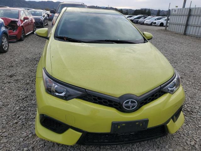 JTNKARJE0GJ507047 - 2016 TOYOTA SCION IM GREEN photo 5