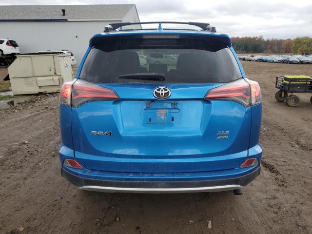 JTMRFREV0GJ097963 - 2016 TOYOTA RAV4 XLE BLUE photo 6