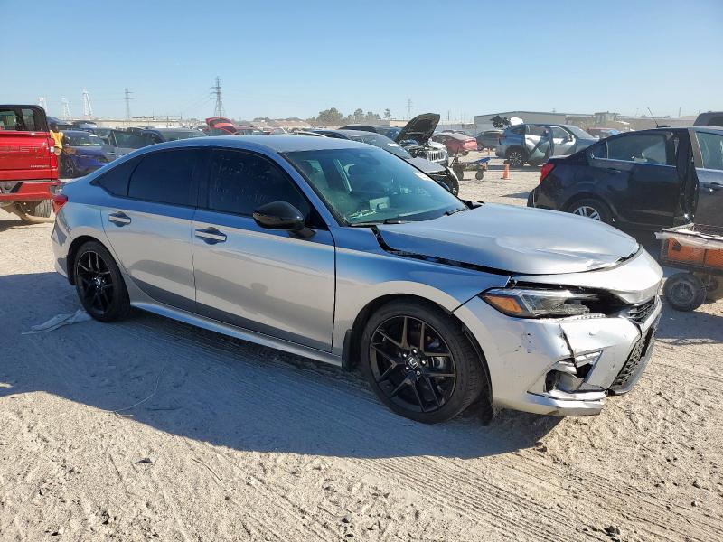 2HGFE2F50RH545930 - 2024 HONDA CIVIC SPORT SILVER photo 4