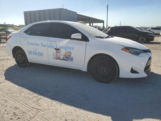 5YFBURHE2KP940990 - 2019 TOYOTA COROLLA L WHITE photo 4
