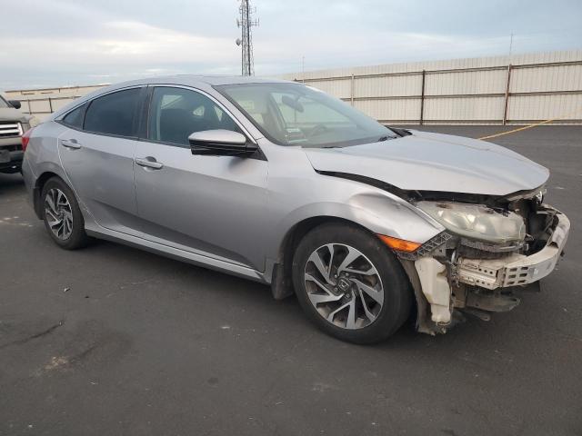 2HGFC2F71GH528672 - 2016 HONDA CIVIC EX SILVER photo 4