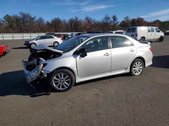 2T1BU4EE2AC285803 - 2010 TOYOTA COROLLA BASE SILVER photo 1