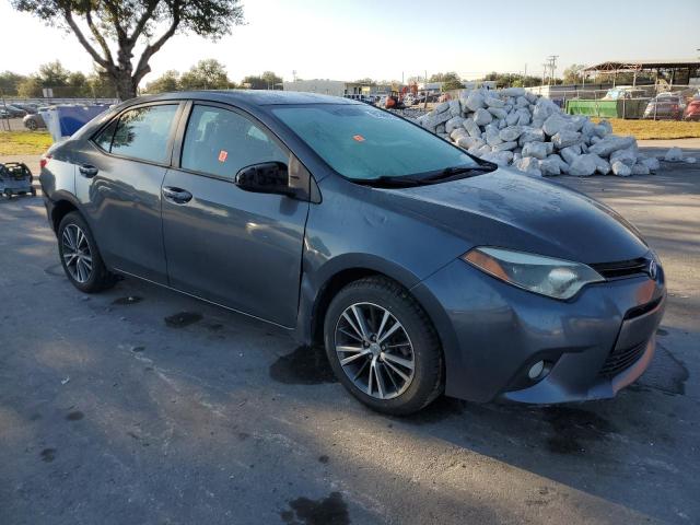 5YFBURHE3GP414472 - 2016 TOYOTA COROLLA L ნაცრისფერი ფოტო 4