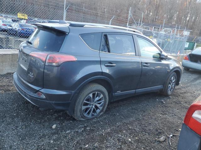 JTMRJREV6JD187137 - 2018 TOYOTA RAV4 HV LE Grau Foto 3