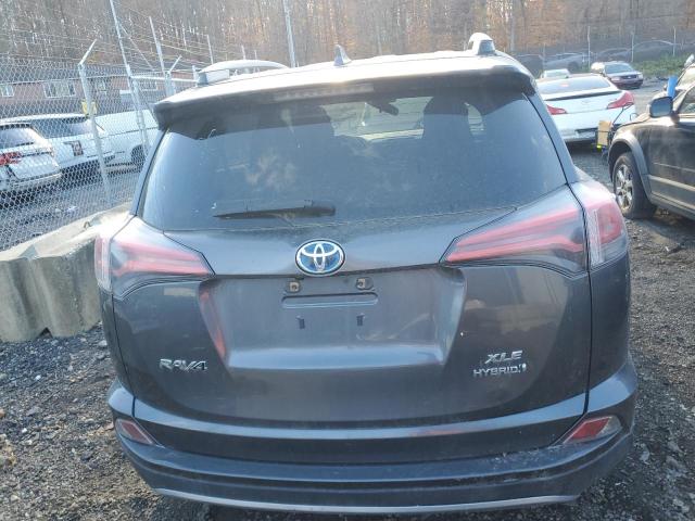 JTMRJREV6JD187137 - 2018 TOYOTA RAV4 HV LE Grau Foto 6