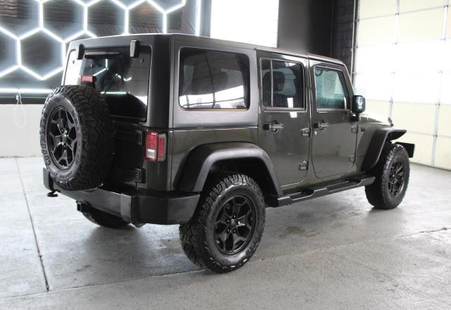 1C4BJWDG9FL670329 - 2015 JEEP WRANGLER U SPORT GRAY photo 3