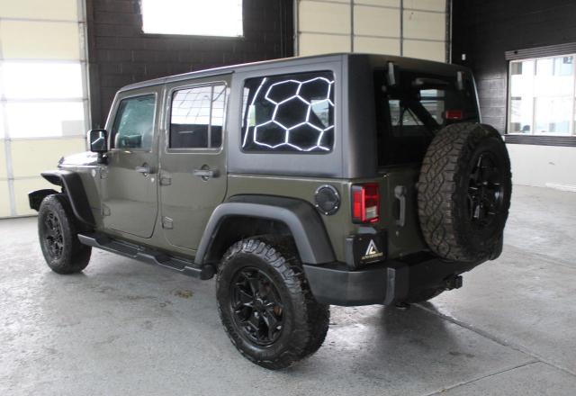 1C4BJWDG9FL670329 - 2015 JEEP WRANGLER U SPORT GRAY photo 4