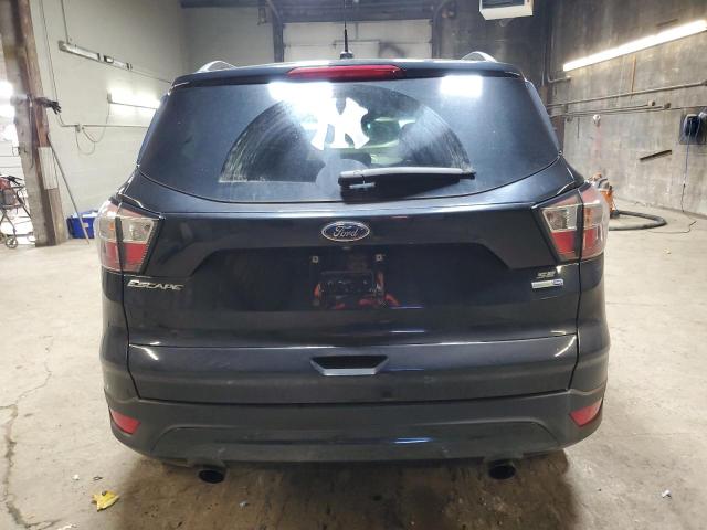 1FMCU9GD7JUC16352 - 2018 FORD ESCAPE SE Schwarz Foto 6