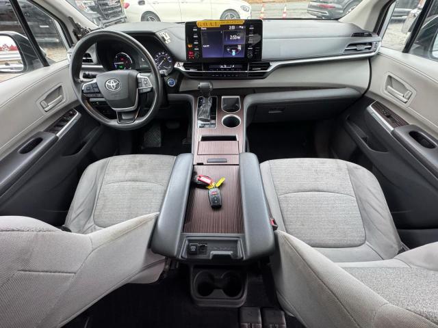 5TDKSKFC4MS036339 - 2021 TOYOTA SIENNA LE SILVER photo 7