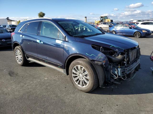 1GYKNBRS6HZ114029 - 2017 CADILLAC XT5 LUXURY BLUE photo 4