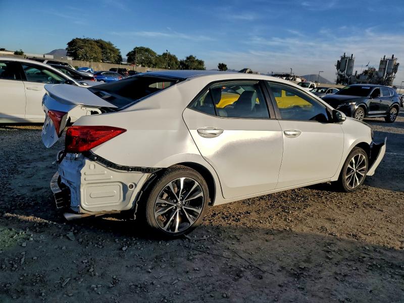 5YFBURHE4KP859070 - 2019 TOYOTA COROLLA L أبيض صورة 3