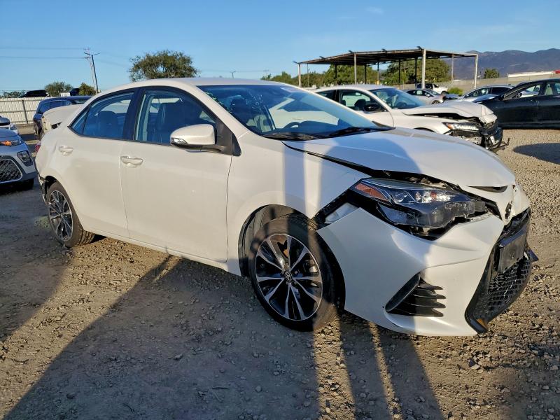 5YFBURHE4KP859070 - 2019 TOYOTA COROLLA L أبيض صورة 4