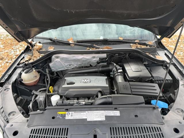 WVGAV7AX6GW516621 - 2016 VOLKSWAGEN TIGUAN S BLACK photo 7